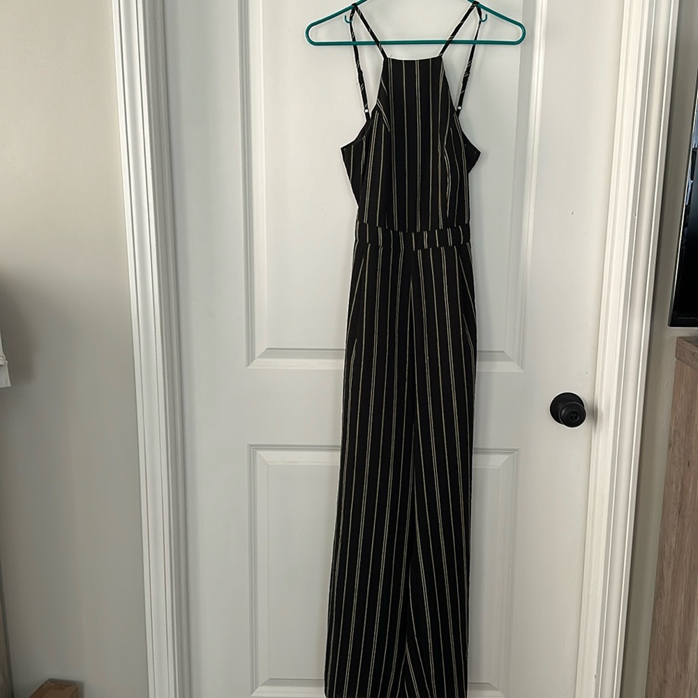 Wide leg open backed black and cream striped jumpsuit
